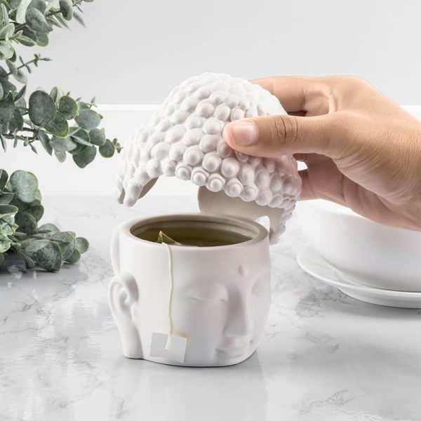 Чаша във формата на глава на Буда с отделяща се горна част.